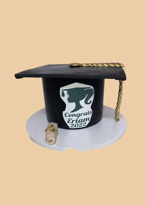 A cake in the shape of a graduation hat.