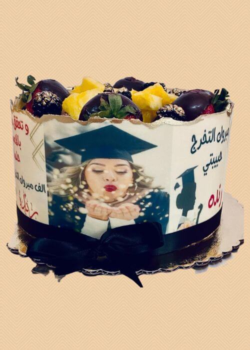A custom graduation cake with photos. in Brooklyn NY.