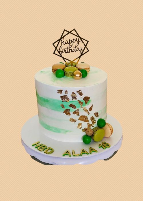 A green and white adult birthday cake.
