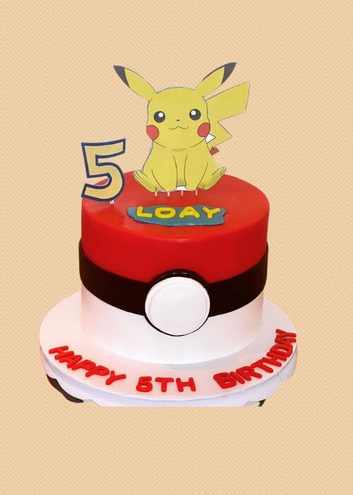 A pokemon cake with pikachu on it.